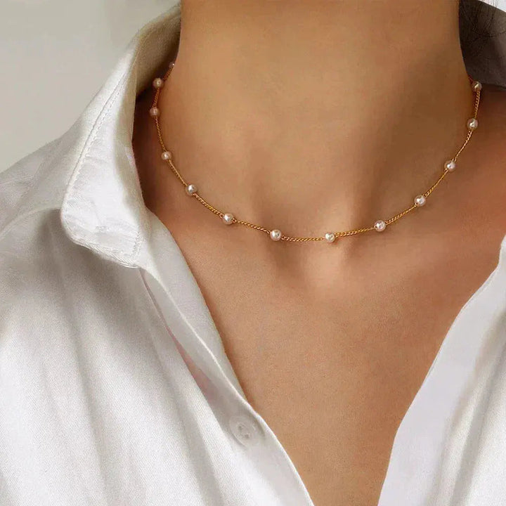 Elegant Gold Necklace with Pearls