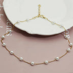 Elegant Gold Necklace with Pearls