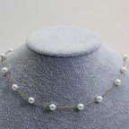 Elegant Gold Necklace with Pearls