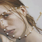 Elegant Gold Necklace with Pearls