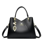 Felina™ - Elegant black shoulder bag with fashionable charms - Eliza-Warszawa