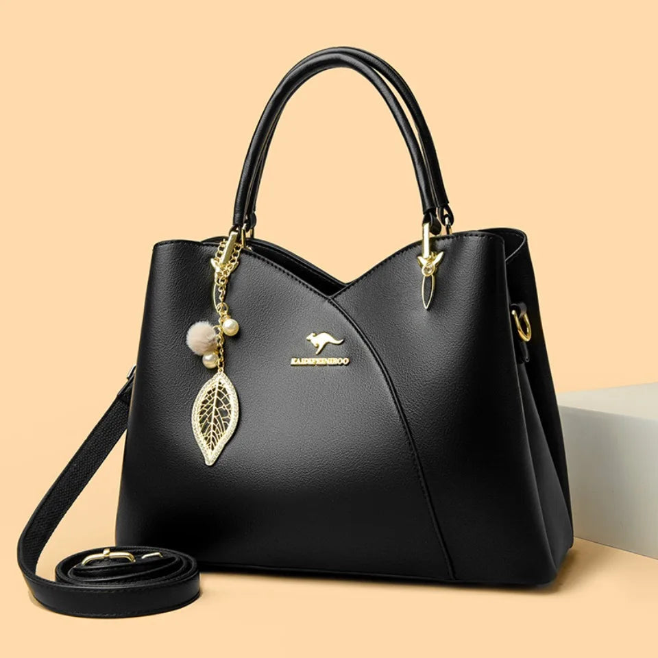 Felina™ - Elegant black shoulder bag with fashionable charms - Eliza-Warszawa