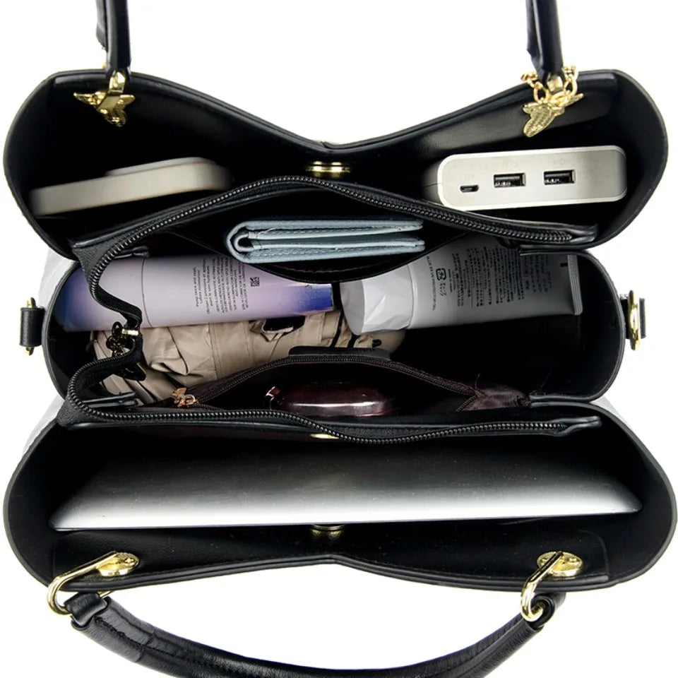 Felina™ - Elegant black shoulder bag with fashionable charms - Eliza-Warszawa