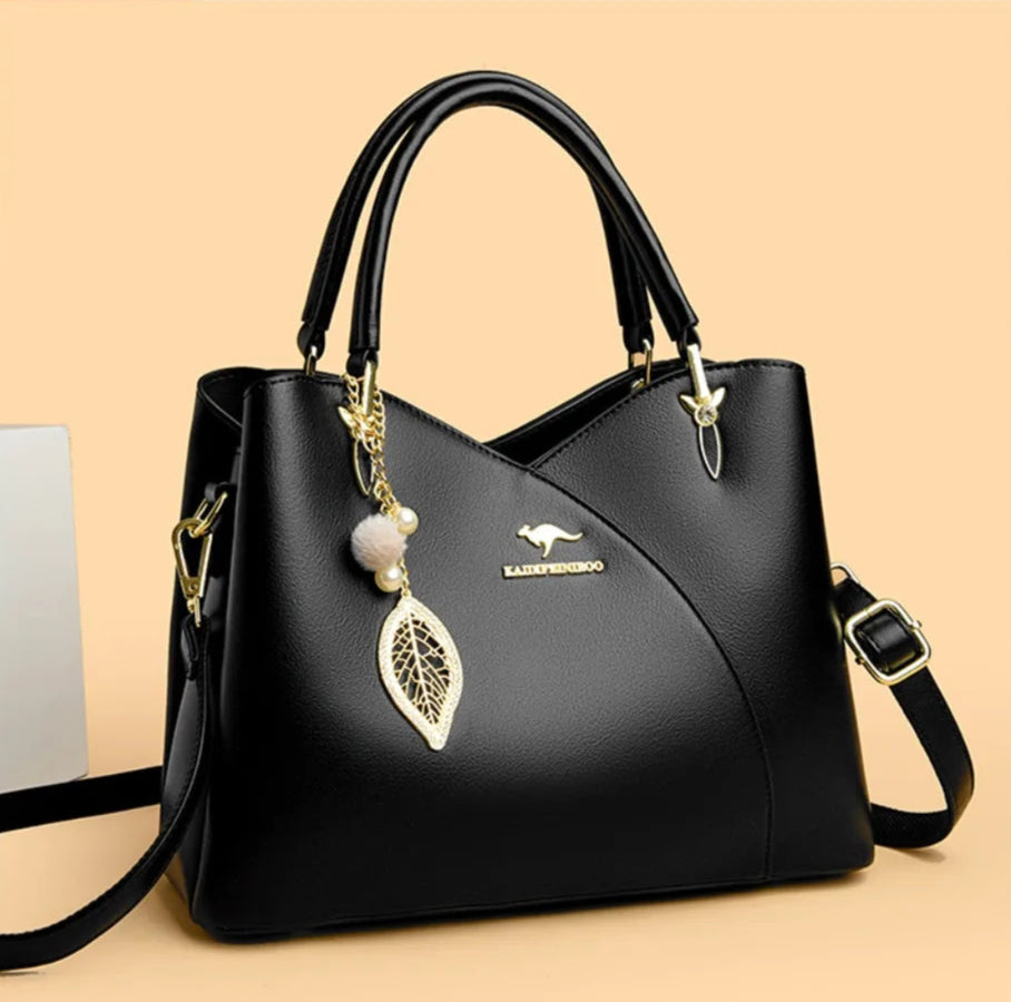 Felina™ - Elegant black shoulder bag with fashionable charms - Eliza-Warszawa