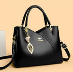 Felina™ - Elegant black shoulder bag with fashionable charms - Eliza-Warszawa