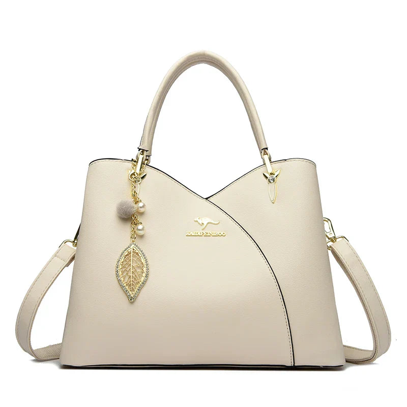 Felina™ - Elegant black shoulder bag with fashionable charms - Eliza-Warszawa