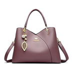 Felina™ - Elegant black shoulder bag with fashionable charms - Eliza-Warszawa