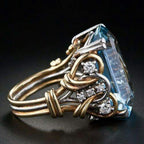 Gold Ring with Blue Zircon Stone