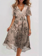 Sophie | Vibrant Boho Print Flowy Midi Dress with V-Neck Silhouette - Eliza-Warszawa