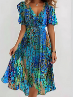 Sophie | Vibrant Boho Print Flowy Midi Dress with V-Neck Silhouette - Eliza-Warszawa