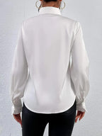 Stylish shirt with ruffled and layered design details. - Eliza-Warszawa