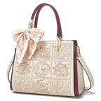 Sylvia™ – A unique crossbody bag with embroidery and a bow - Eliza-Warszawa