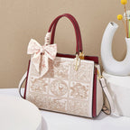 Sylvia™ – A unique crossbody bag with embroidery and a bow - Eliza-Warszawa